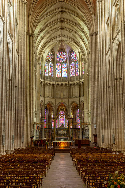 istock Auxerre Cathedral nave showing Gothic architecture and stained glass 2240777510