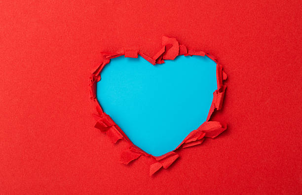 istock Tear open the paper into a heart-shaped shape 2240778301