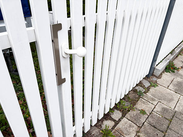 Beautiful White Colored Wooden Boundary Of Lawn Park Or Exterior Of House