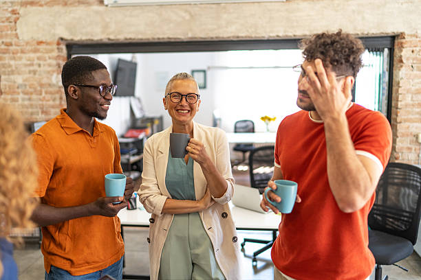 istock Diverse business people taking coffee break in office 2240779901