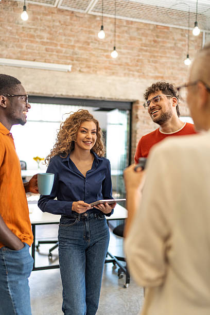 istock Diverse business people collaborating in modern office meeting 2240779980