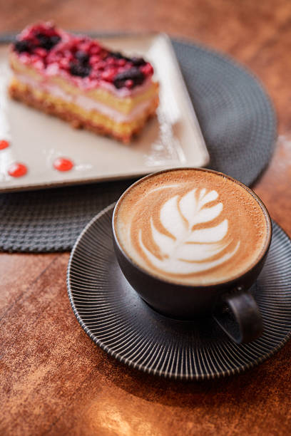 istock Latte and Berry Layer Cake Served on Wooden Table 2240784238