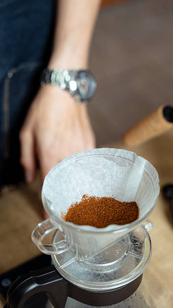 istock Preparing pour over coffee with fresh ground beans 2240793439