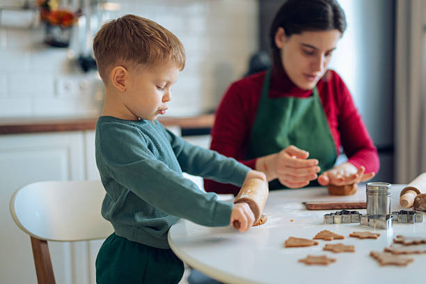 istock Fun activity with mom,making Christmas cookies together. 2240793623