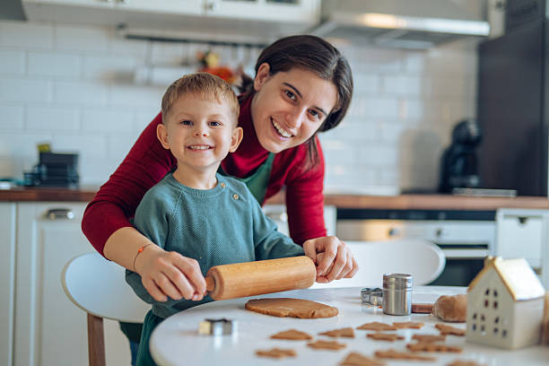 istock Fun activity with mom,making Christmas cookies together. 2240793634