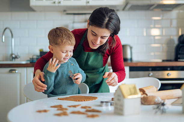 istock Fun activity with mom,making Christmas cookies together. 2240793641