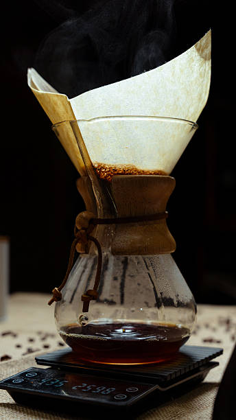 istock Pour over coffee brewing in glass carafe 2240794298