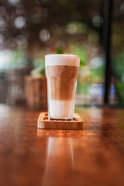 istock Iced Latte Macchiato with Frothy Milk and Cinnamon 2240794565