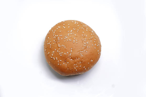 istock Round burger bun for sandwich isolated on white. 2240794574