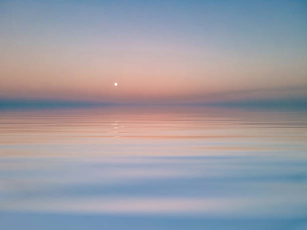 istock Sunset over the Ocean and Sky in East Timor 2240794618