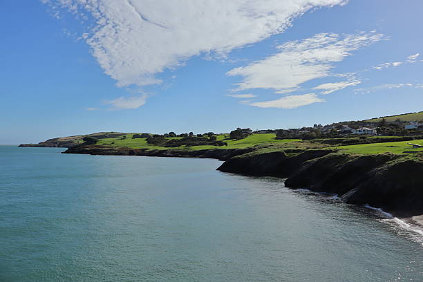 istock Irish Sea Coastline Near Wicklow Under Soft Clouds 2240802965
