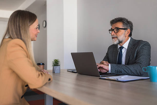 istock Business man interviewing female candidate for job recruitment 2240803582