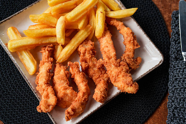 istock Crispy Chicken Tenders with Fries 2240812024