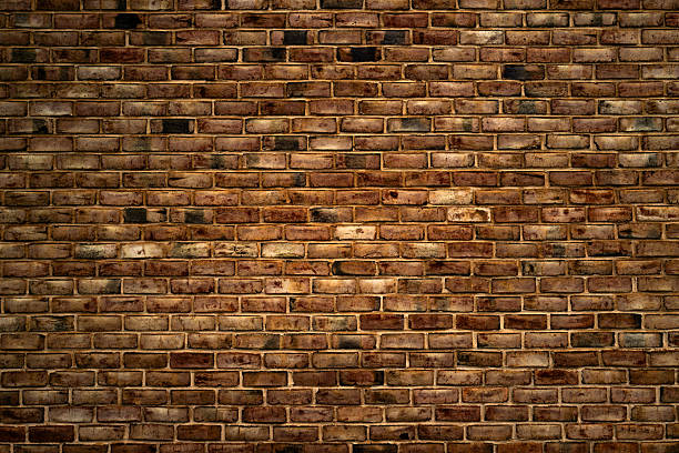 istock Old brick wall texture for background or wallpaper. Vintage masonry surface with bricks. Stone wall for design and construction themes. Rustic brickwork, wall backdrops. Old masonry wall. 2240812553