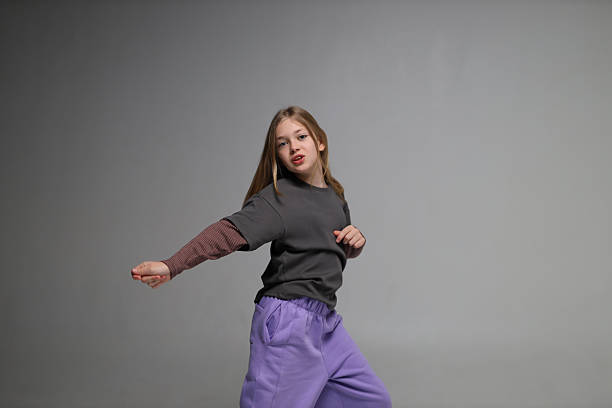 istock Young caucasian girl in casual outfit posing with confident expression in studio 2240813314