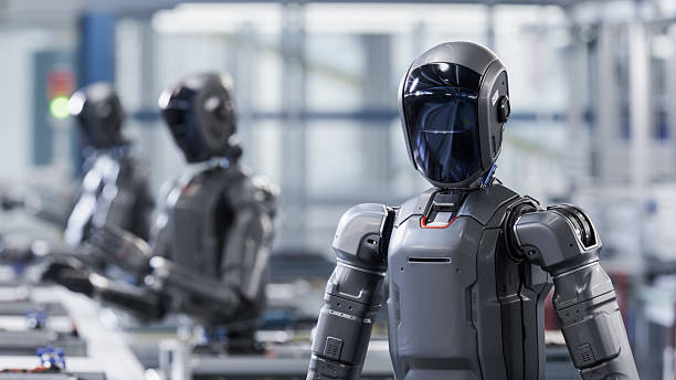 istock 3D Render: Industrial AI Transformation: Autonomous AI Powered Humanoid Robot Walking through a Factory and Transporting a Box. Advanced Human Like Smart Robot Working in Industrial Environment. 2240813698