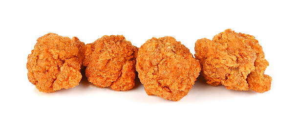 istock Fried spicy chicken wings isolated on white 2240815297
