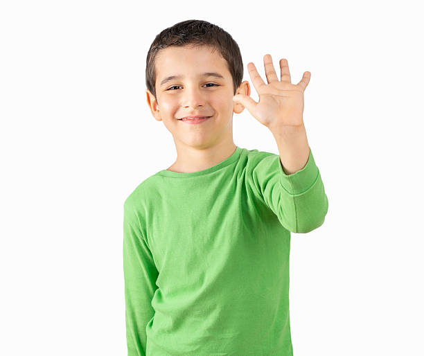 istock Little boy greeting with hand 2240819354