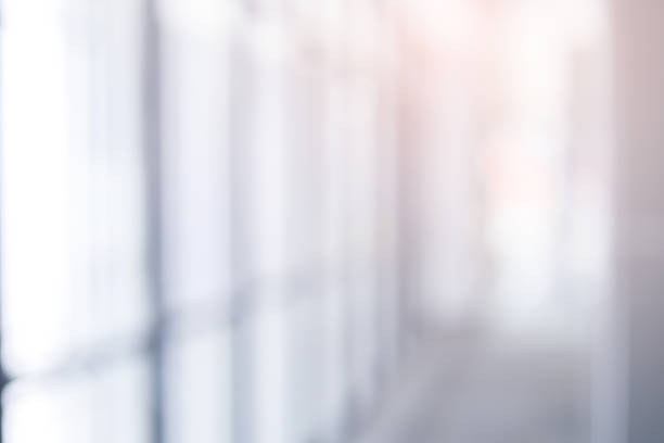 istock Abstract blurred inside interior of hospital building background with shine light for advertisement design and show content concept 2240821670
