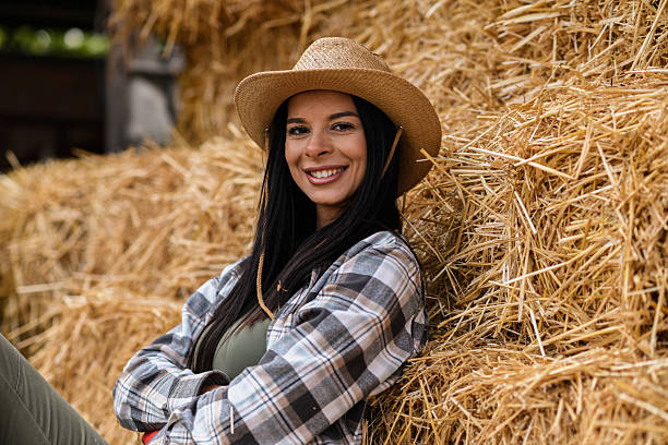 istock Smiling Female Farmer Portrait on Hay 2240823854