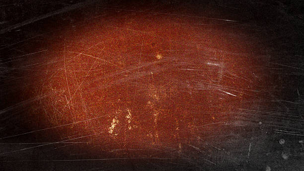 istock A scratched surface of a worn, reddish-brown old cardboard sheet in a dark frame. 2240826179