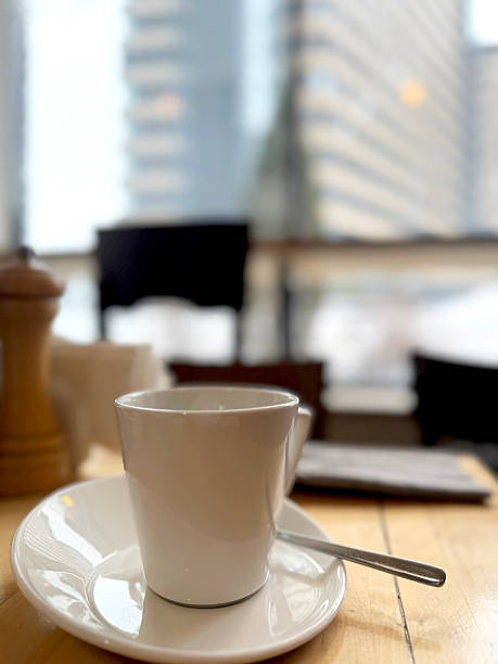 istock white coffee cup and saucer on the table on a blurred background 2240826243