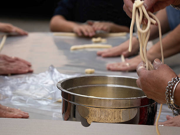 istock Hands that work the artisanal pasta of Umbria 2240829658