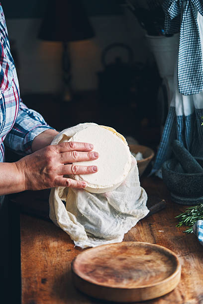 istock Making Fresh White Cheese in Domestic Kitchen 2240832862