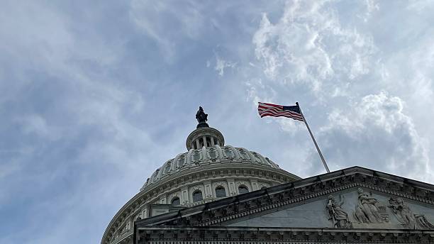 istock American flag waving with the Capitol Hill 2240838523