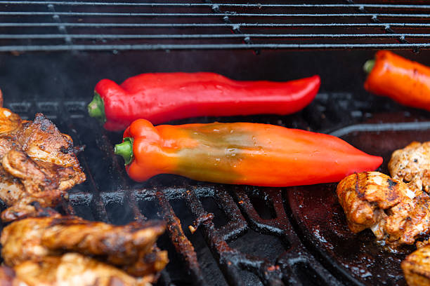 istock Grilled Chicken and Red Peppers on a Summer Barbecue 2240840088