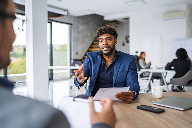 istock Black entrepreneur presenting business ideas during job interview 2240840953