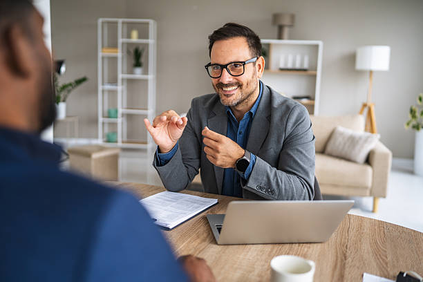 istock Businessmen meeting, consulting about project, discussing strategy in office 2240840981