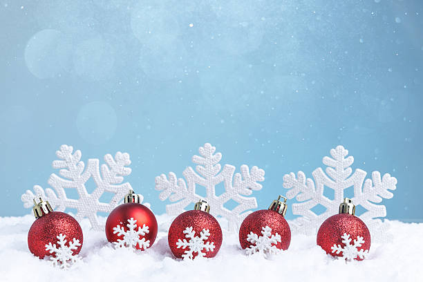 istock Festive Red Ornaments Featuring Beautiful Snowflakes Set Against a Charming Winter Background 2240842037