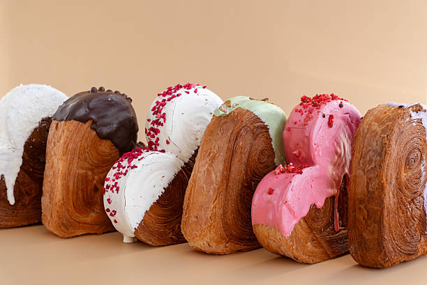 istock Valentine's Day Birthday holiday present gift idea Coffee cappuccino latte beverage drink Morning breakfast Holiday birthday anniversary shiny candle sparkler on cake Delightful and vibrant heartshaped pastry croissant treat, beautifully topped with 2240849573