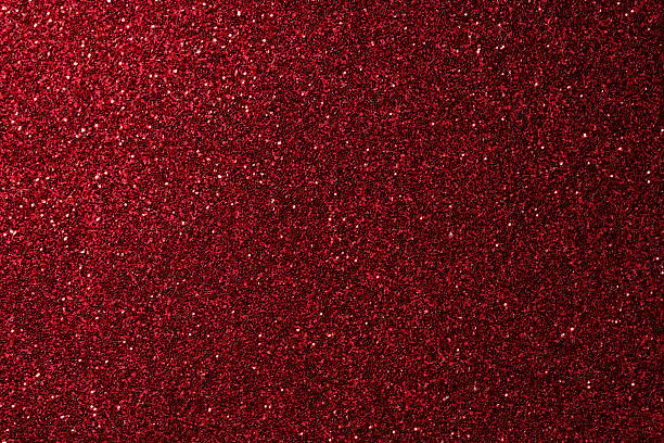 istock Close-Up of Red Glitter Texture with Sparkling Highlights 2240849873