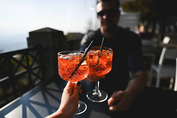 istock Couple toasting Spritz cocktails on summer vacation 2240852956