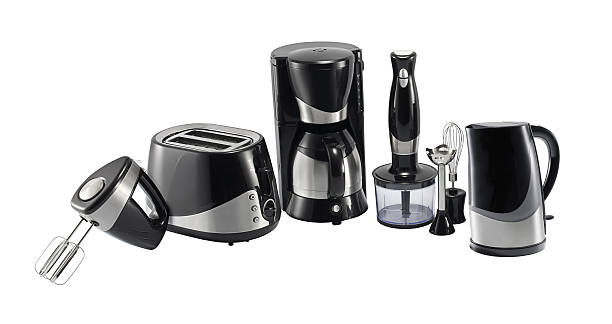 Chic and modern small household appliances on white background
