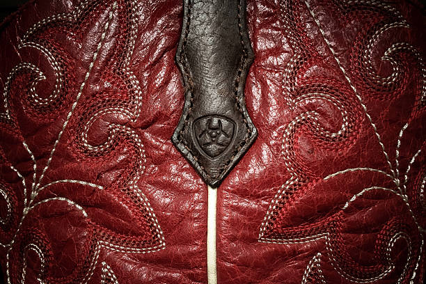 Ariat boot captured showing great stitching detail and a vibrant red color