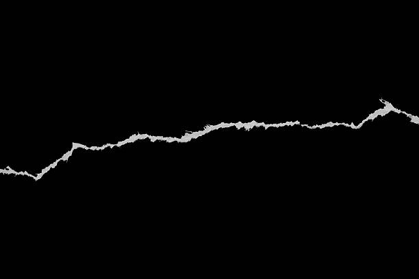 istock Ripped torn paper edges isolated on black background 2240865044