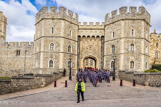 March 11, 2025, Windsor, UK: Royal guards are marching out of the gate of the Windsor Castle in Great Britain