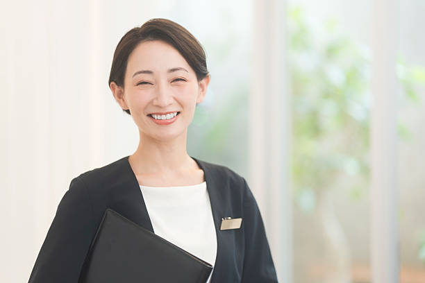 istock A Japanese woman working in a black jacket 2240881364