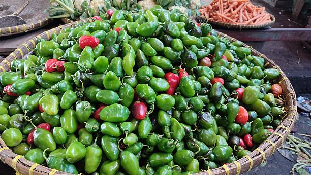 istock large green chilies in a woven container 2240888588
