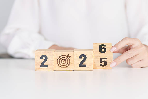istock 2025 year change to 2026 year block with dartboard icon. Goal, Target, Resolution, strategy, plan, Action, mission, motivation, and New Year start concepts 2240888944