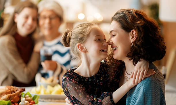 istock Family celebrating Thanksgiving Day 2240890866