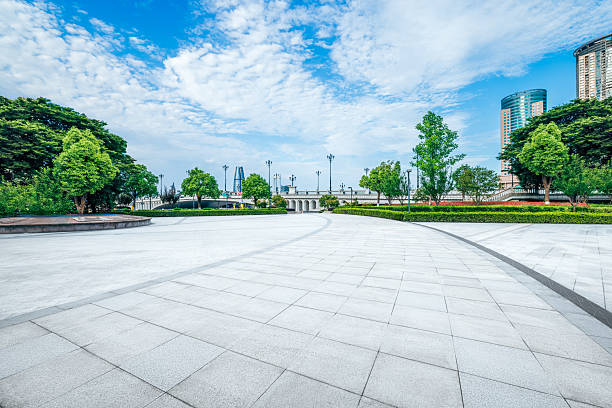istock Wide empty brick plaza in urban park. 2240893266