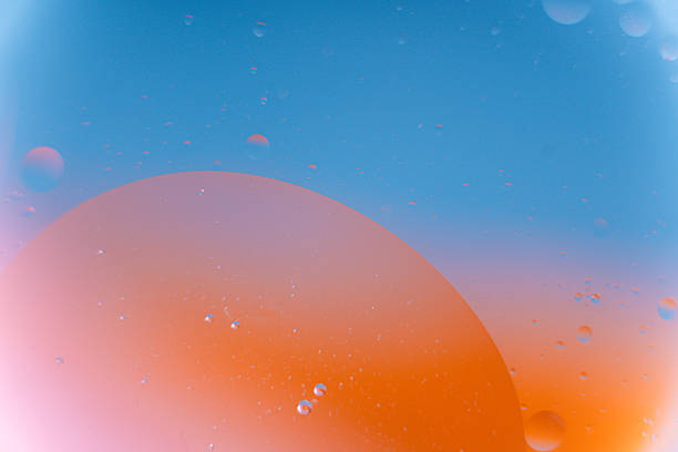 istock Vibrant Macro Abstract Fluid Background with Pink, Blue, and Orange Hues 2240893423