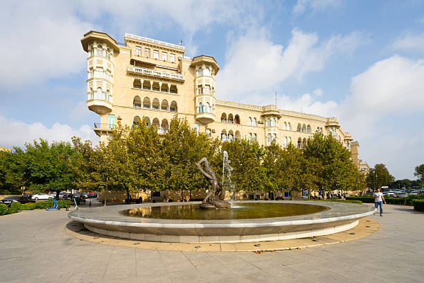 Baku, Azerbaijan. october 9, 2025. the fountain with the Behram- Gur Monument in a square of the city center