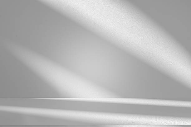 istock Wall interior background, studio and backdrops show products.with shadow from window color white . background for text insertion and presentation product 2240897893