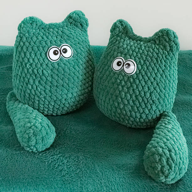 Cute knitted cats from plush yarn. Amigurumi technique. Toy animals. Homemade plush cats. Romantic gift. Toy for a girl, woman, child or for a baby shower party. Home comfort. Knitted decor. Valentine's Day.