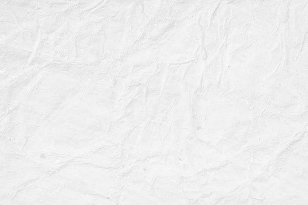 istock White coloured crumpled crushed wrinkled crinkled paper horizontal vector backgrounds with uneven wrinkles crease all over like a plain blank empty waste page with copy space 2240909612